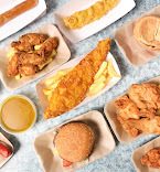 Traditional British Fish and Chips with Lemon and Sauce
